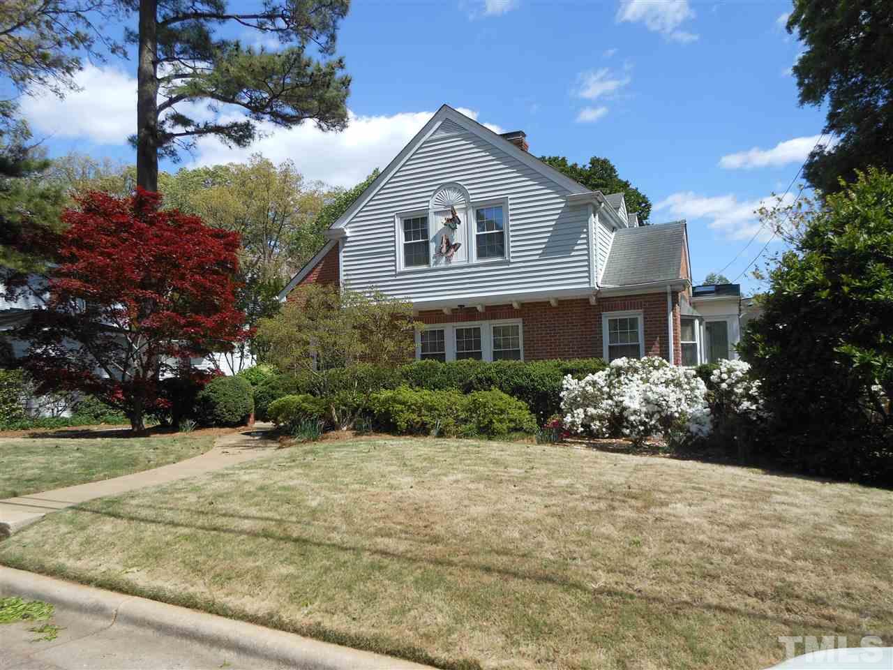 2404 White Oak Road Raleigh, NC 27609 - Photo 23 of 23 a front view of a house with a garden
