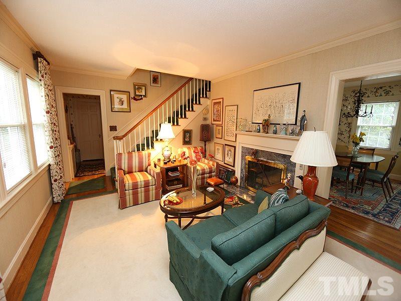 2404 White Oak Road Raleigh, NC 27609 - Photo 4 of 23 a living room with furniture and wooden floor