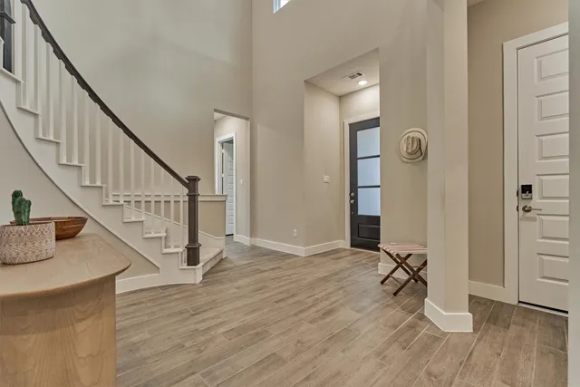 a view of entryway with wooden floor
