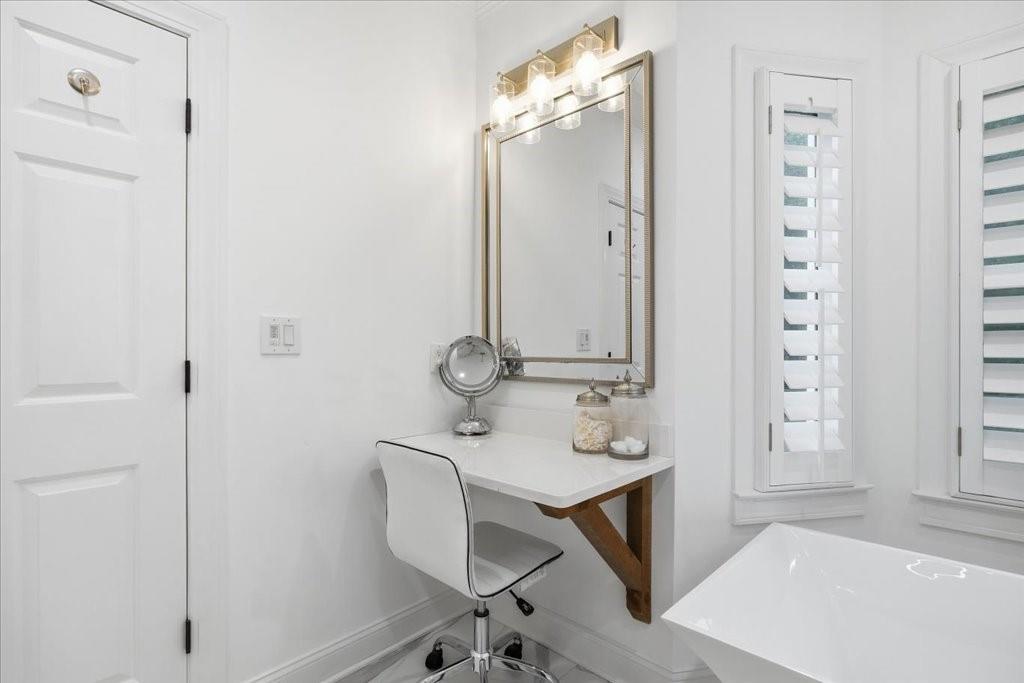 397 Thomas Road Dallas, GA 30132 - Photo 43 of 108 a bathroom with a sink vanity and a mirror