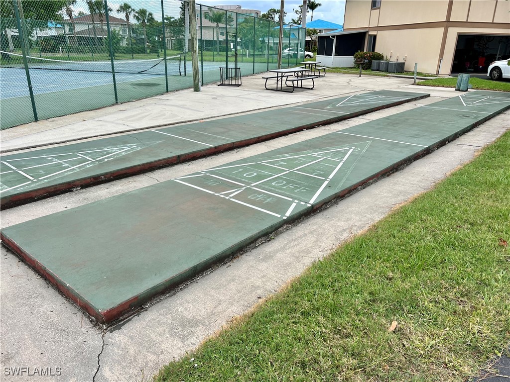 5804 Newfoundland Fort, Unit 1 Fort Myers, FL 33907 - Photo 27 of 29 a view of a backyard