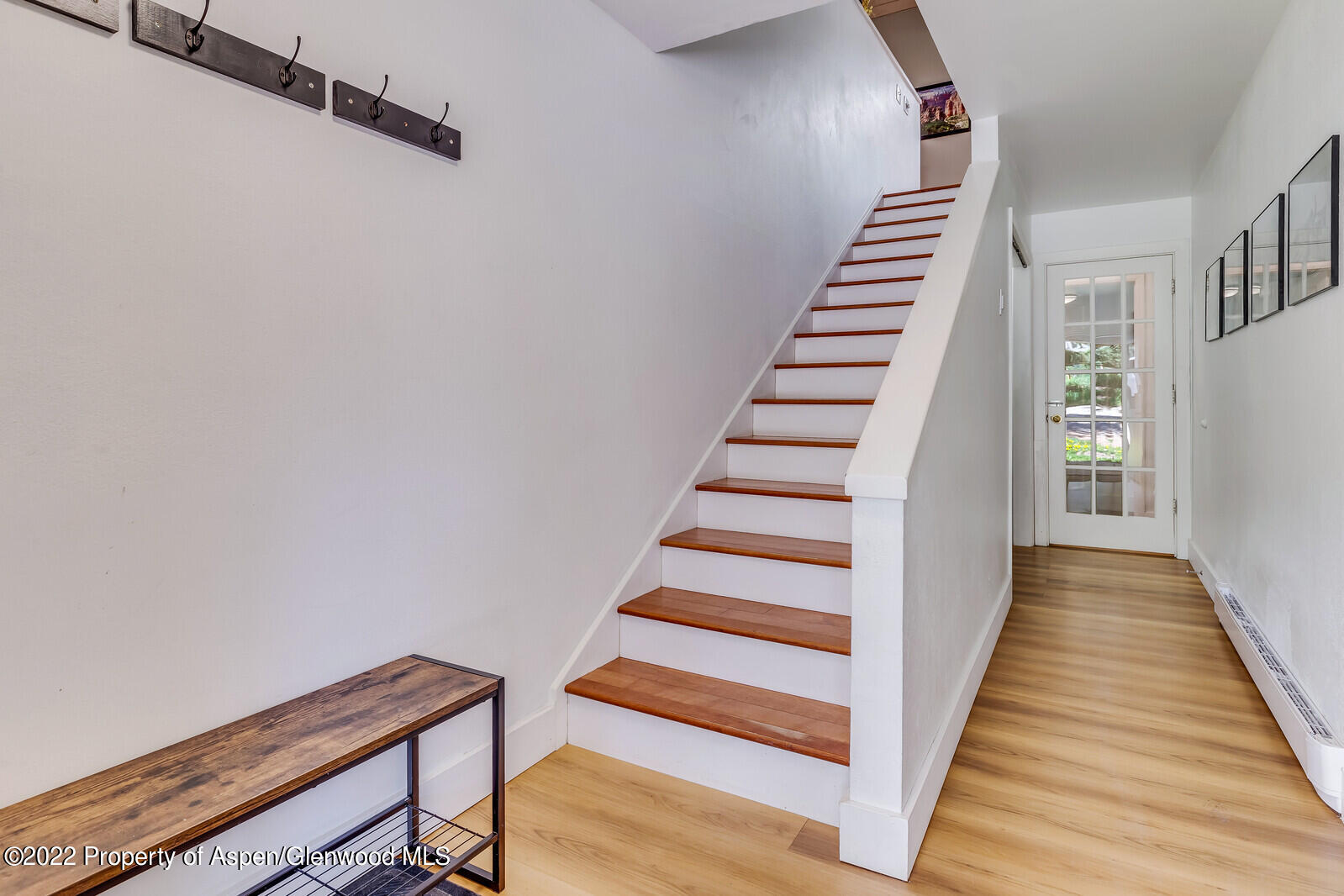 36 Nathan Lane Basalt, CO 81621 - Photo 15 of 37 a view of a hallway with wooden floor and stairs