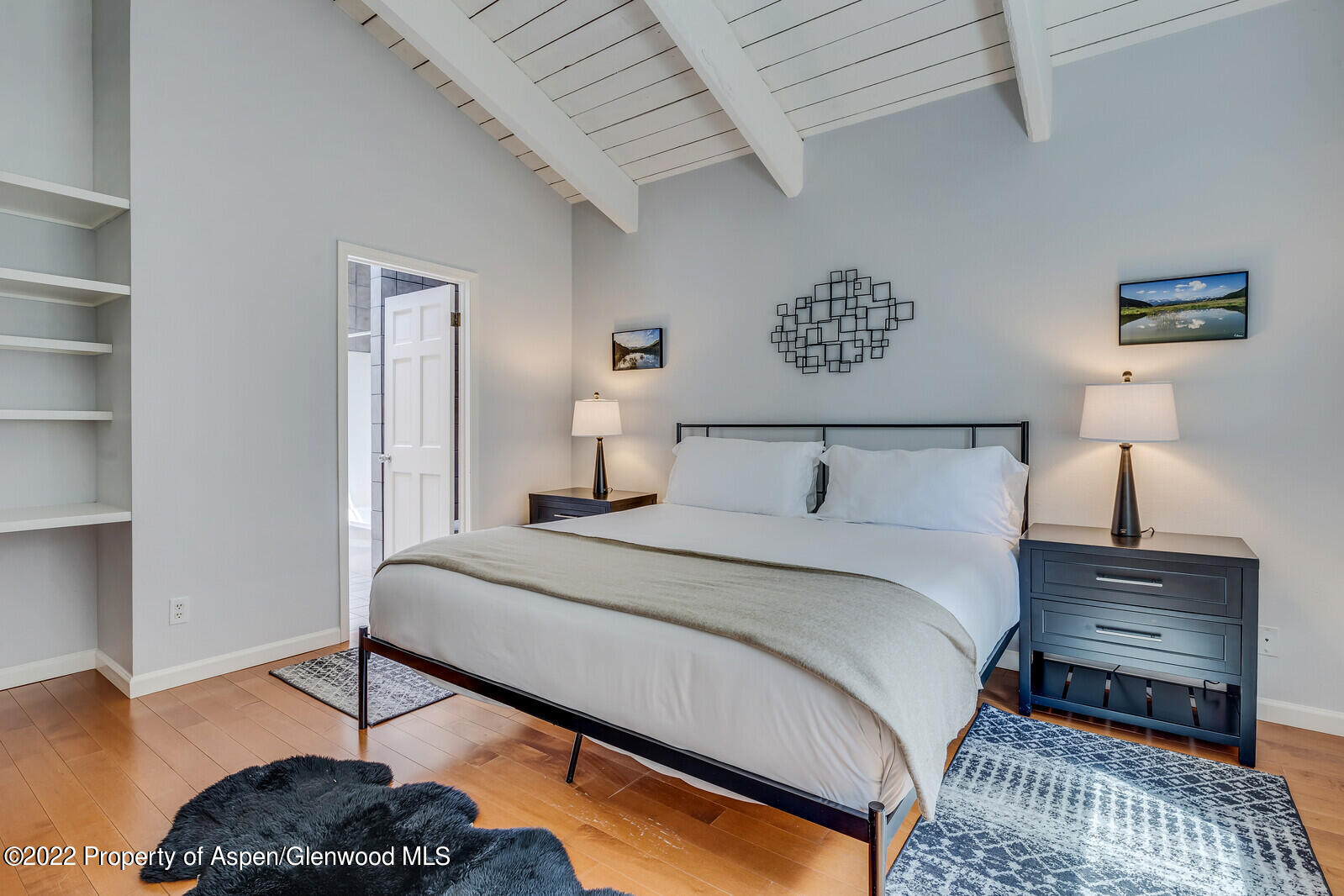 36 Nathan Lane Basalt, CO 81621 - Photo 21 of 37 a bedroom with a bed and a dresser
