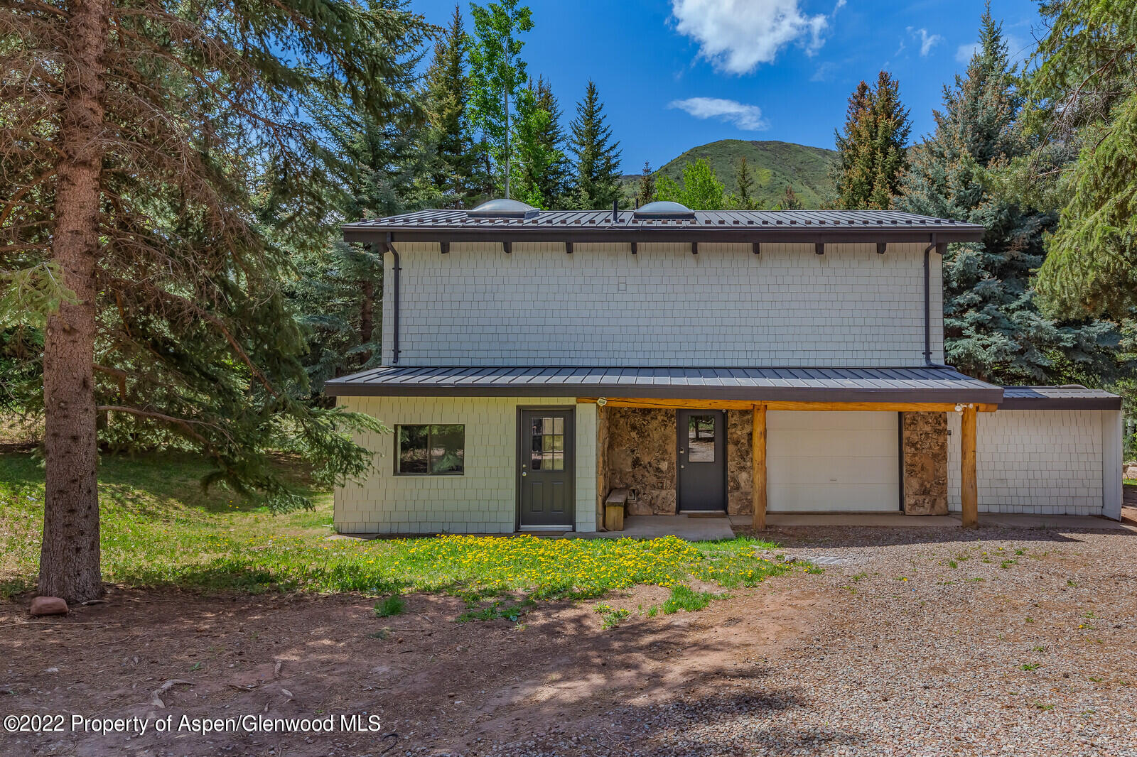 36 Nathan Lane Basalt, CO 81621 - Photo 3 of 37 front view of house with a yard