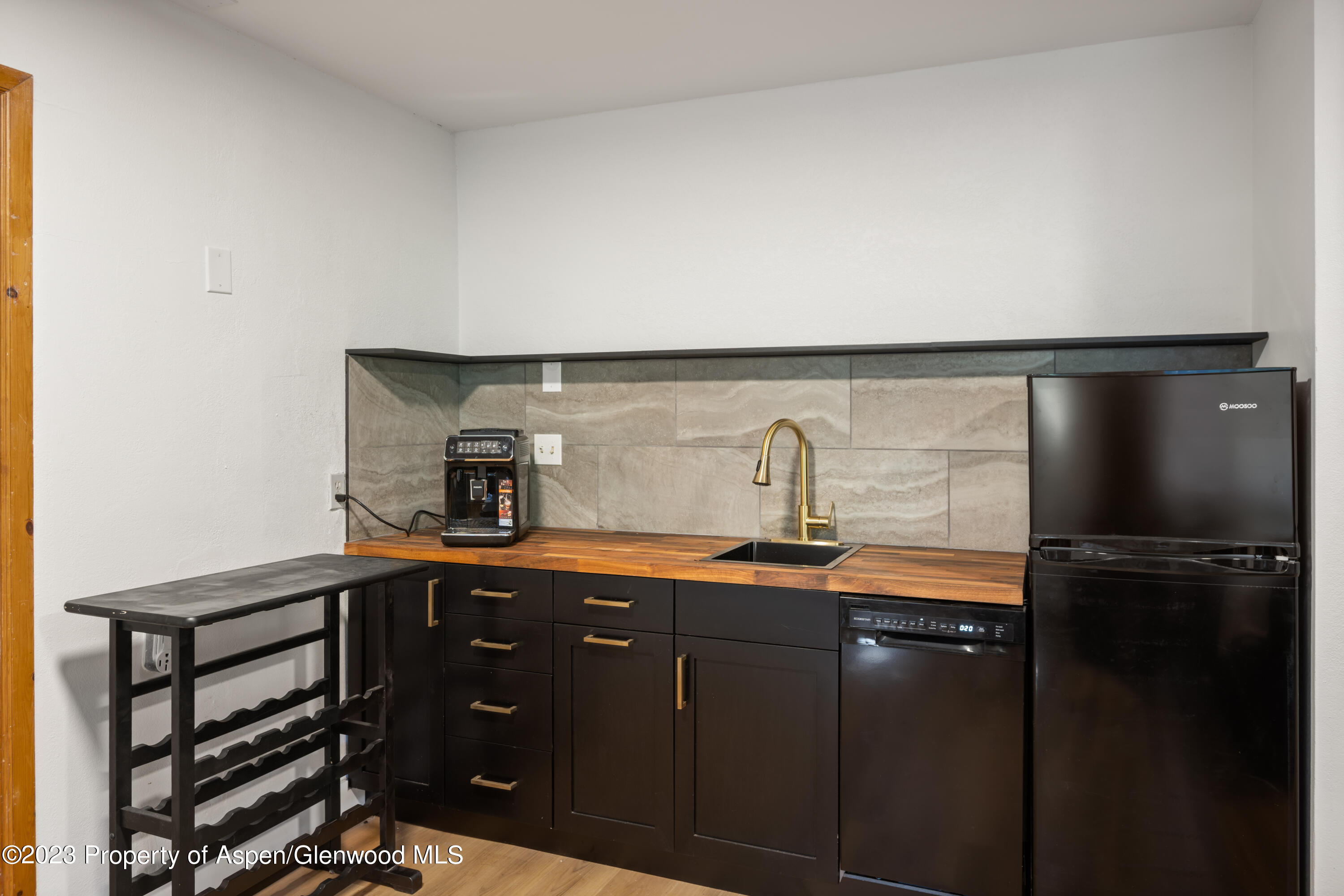36 Nathan Lane Basalt, CO 81621 - Photo 32 of 37 a kitchen with a sink and cabinets