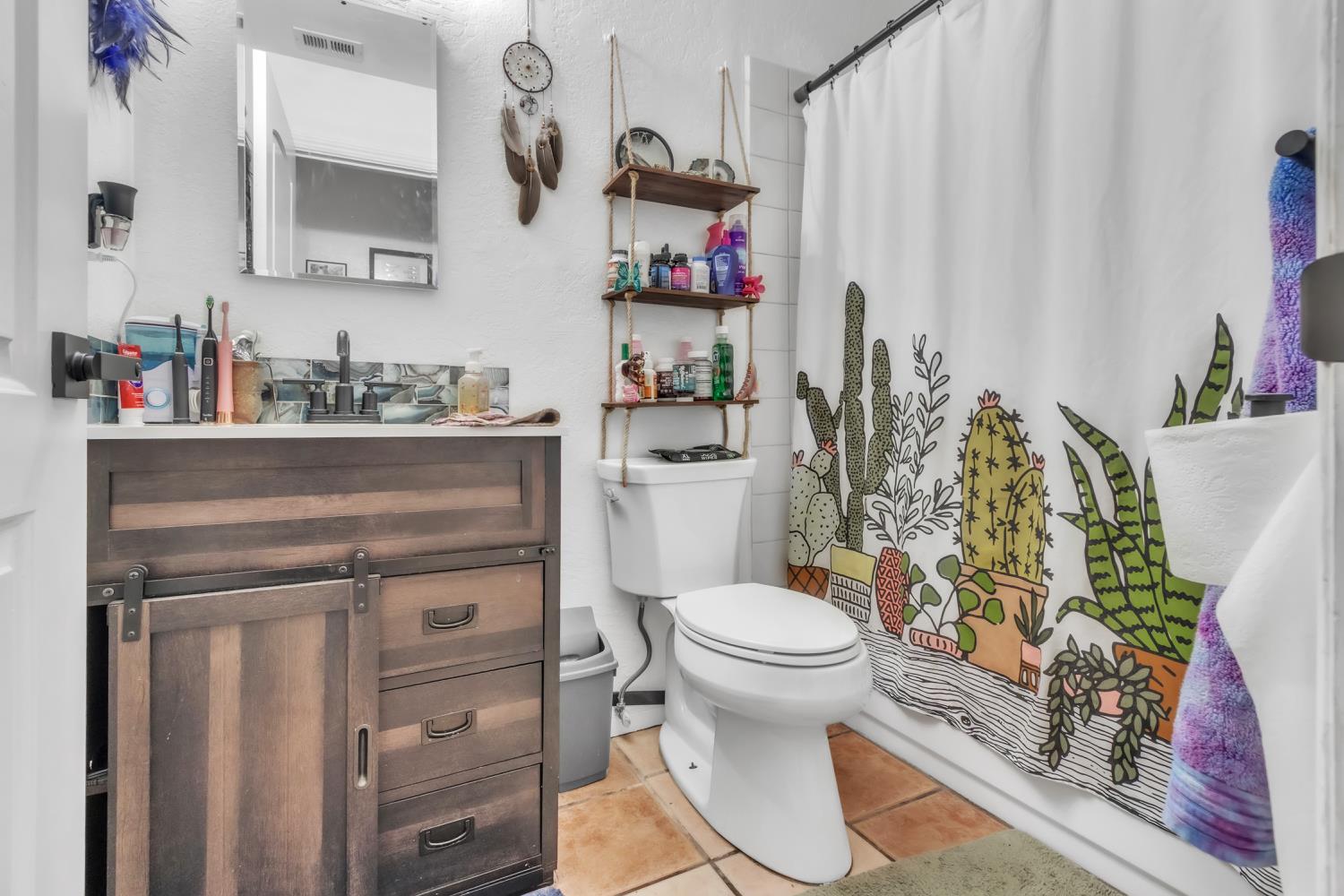 5812 Keyntel Street Citrus Heights, CA 95621 - Photo 14 of 30 a bathroom with a sink toilet and shower