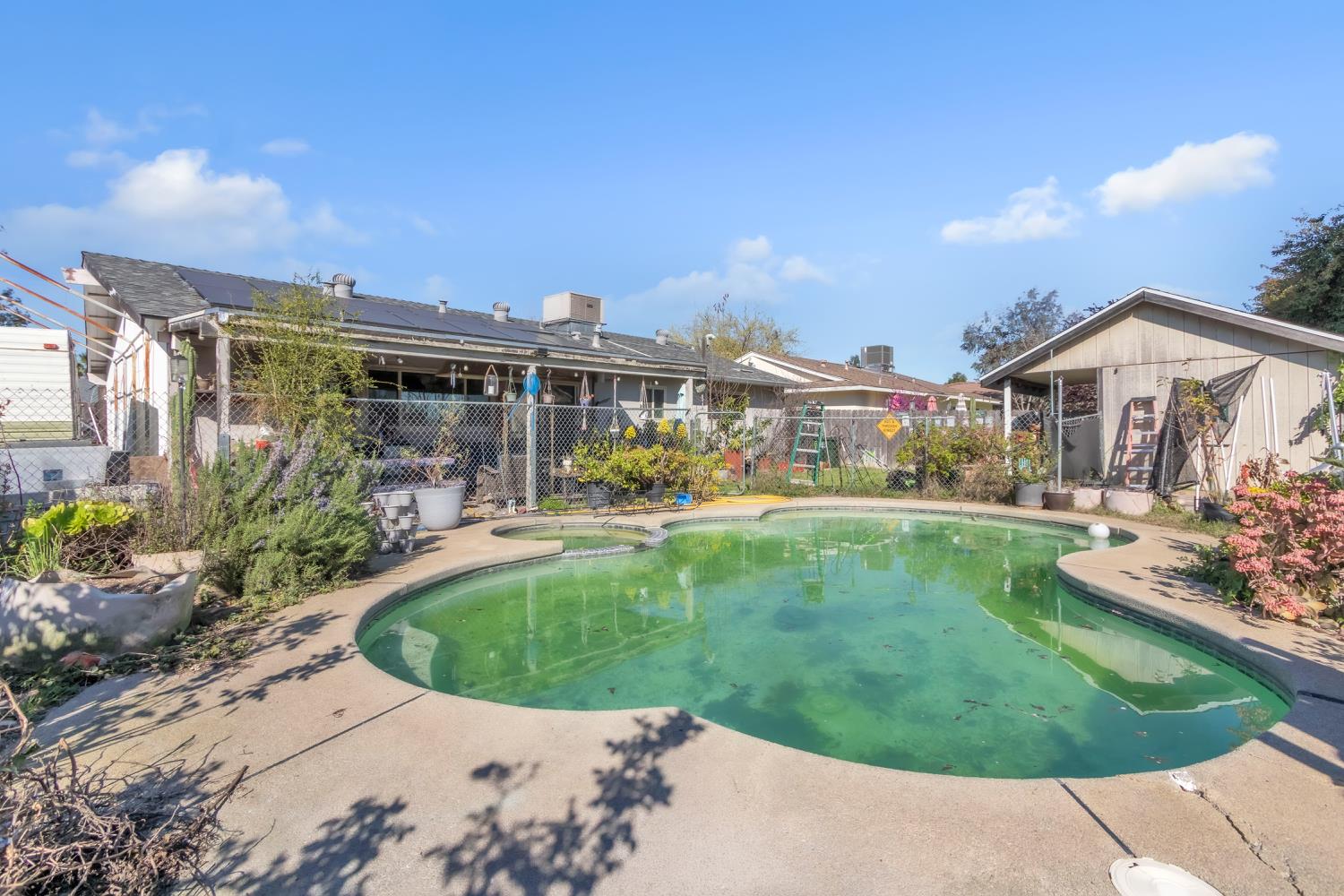 5812 Keyntel Street Citrus Heights, CA 95621 - Photo 15 of 30 a view of a house with a swimming pool