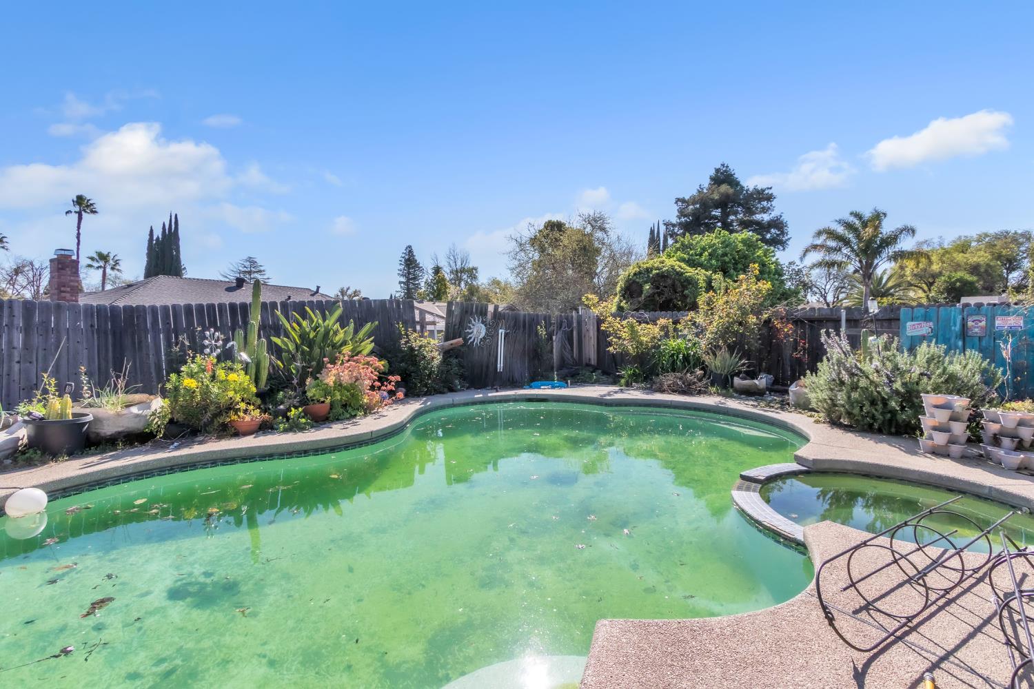 5812 Keyntel Street Citrus Heights, CA 95621 - Photo 16 of 30 a view of a garden with a bench in a garden