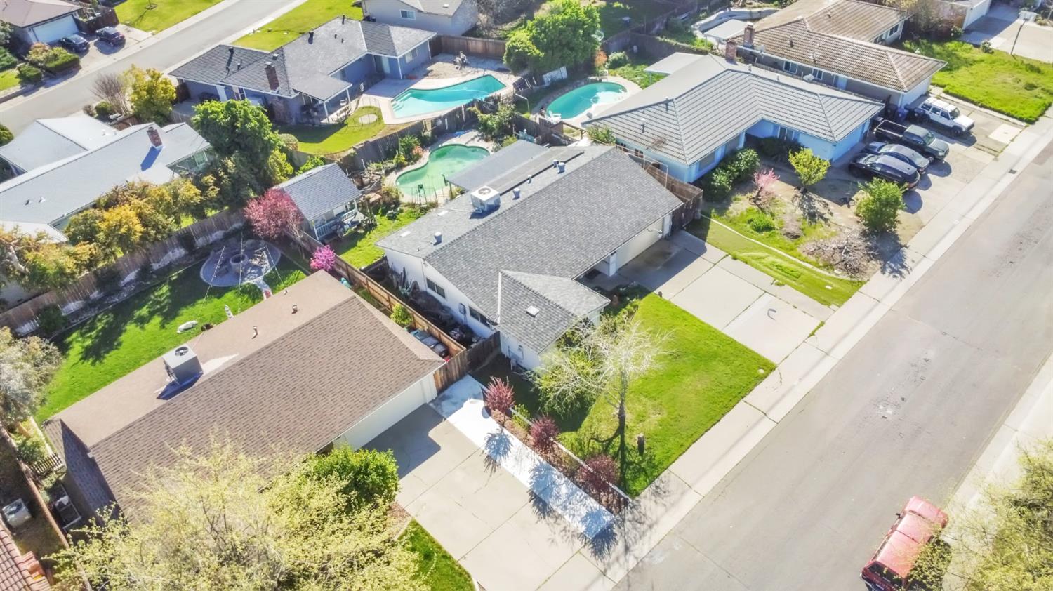 5812 Keyntel Street Citrus Heights, CA 95621 - Photo 28 of 30 an aerial view of a house with a yard and a garden