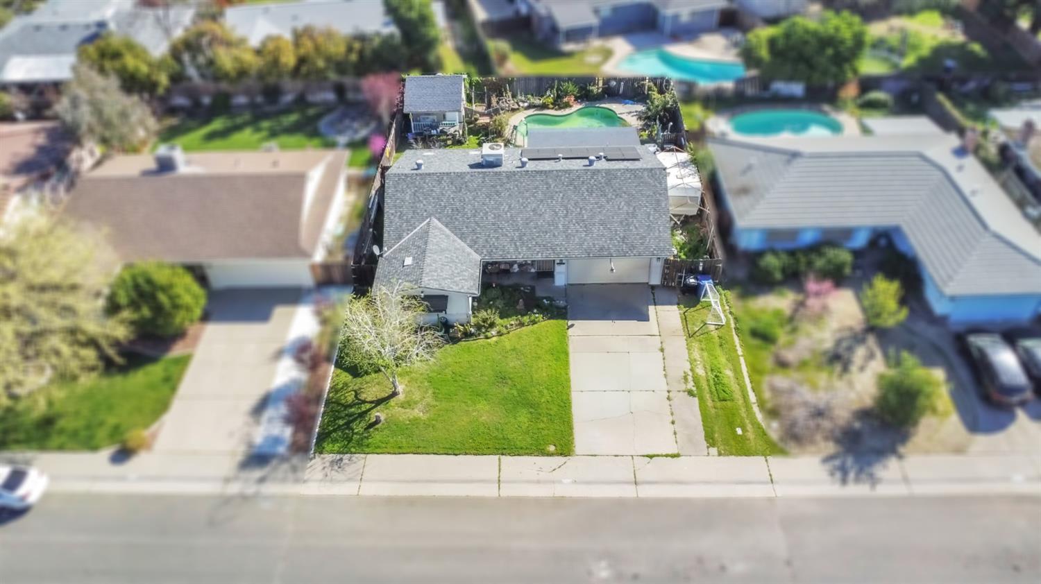 5812 Keyntel Street Citrus Heights, CA 95621 - Photo 30 of 30 an aerial view of a house with a garden and pathway