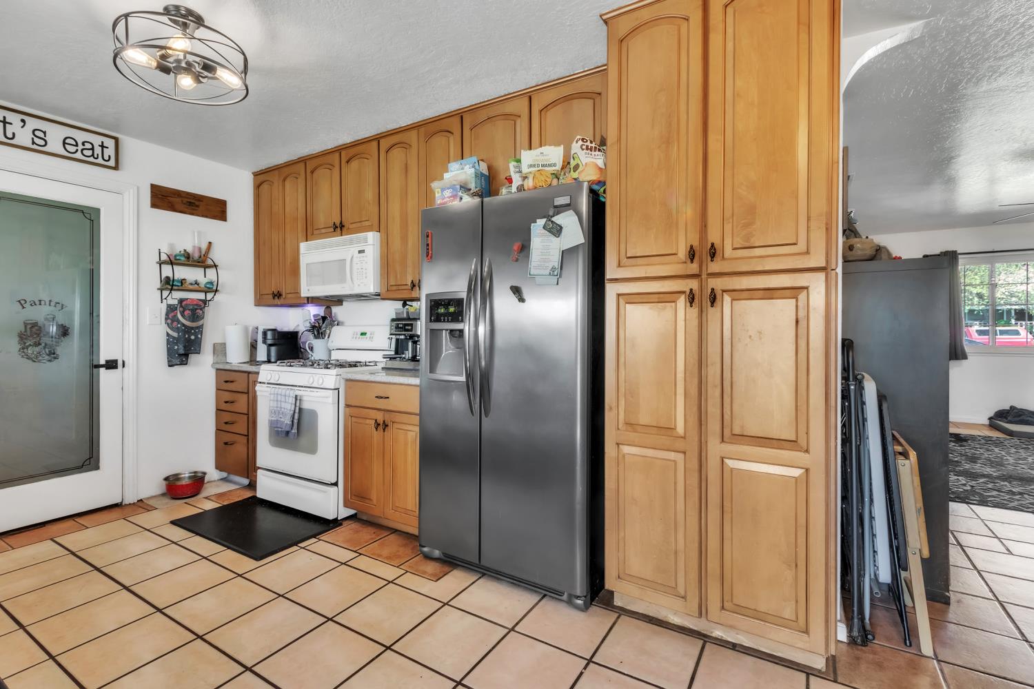 5812 Keyntel Street Citrus Heights, CA 95621 - Photo 8 of 30 a kitchen with stainless steel appliances granite countertop a refrigerator and a sink