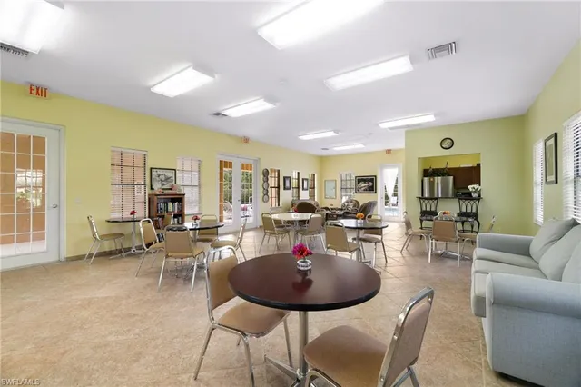 a view of house with yard outdoor seating and barbeque oven