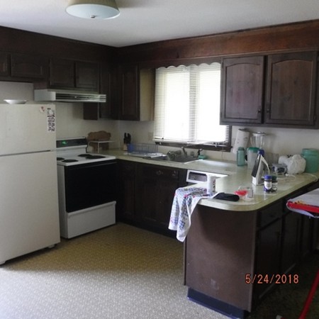 13 Briarwood Road Rutland, MA 01543 - Photo 6 of 19 a kitchen with stainless steel appliances granite countertop a sink a stove and a refrigerator