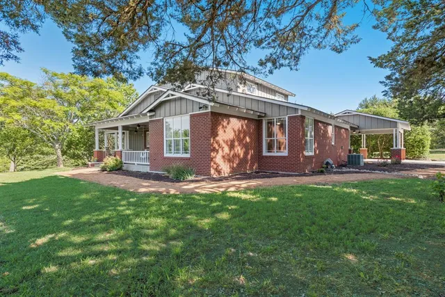 a view of a house with a patio