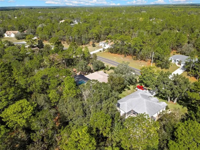 aerial view of a house with swimming pool