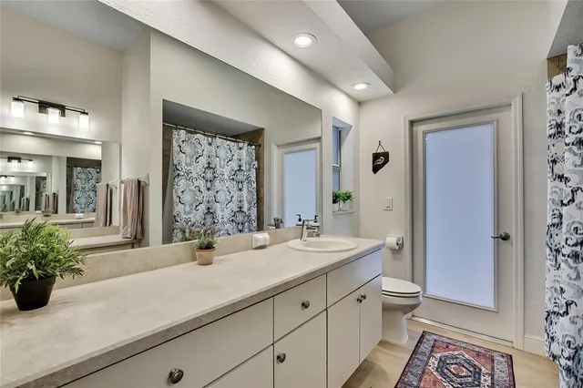 a view of a dinning table and chairs in the patio