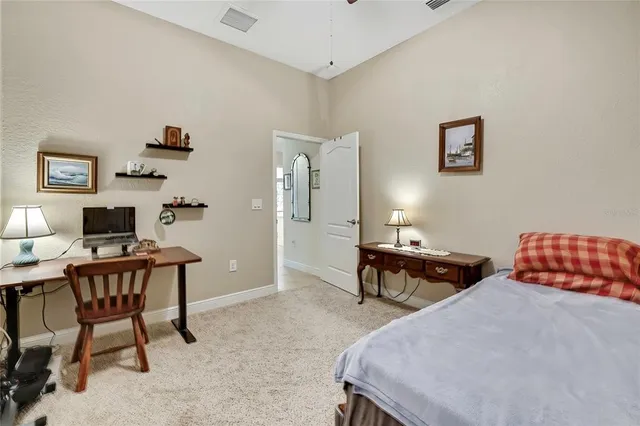 a view of a swimming pool with a porch