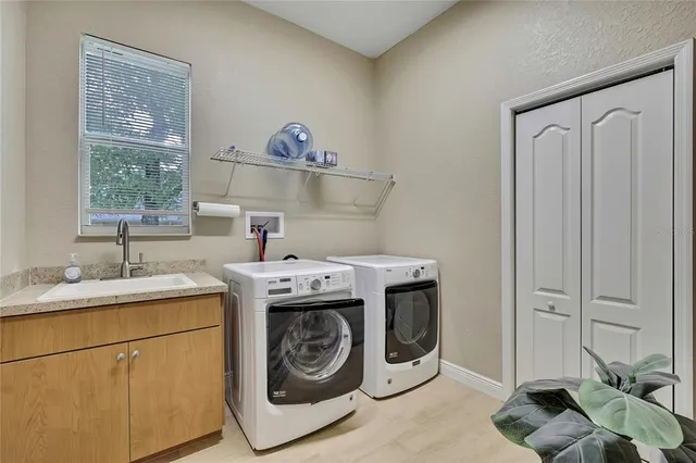 a view of a swimming pool with a patio