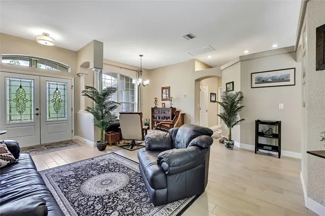a view of a room with furniture window and wooden floor