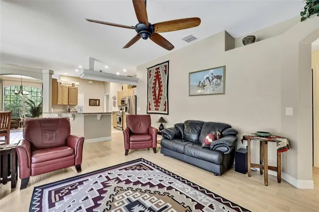 a spacious bedroom with two beds and gym equipment