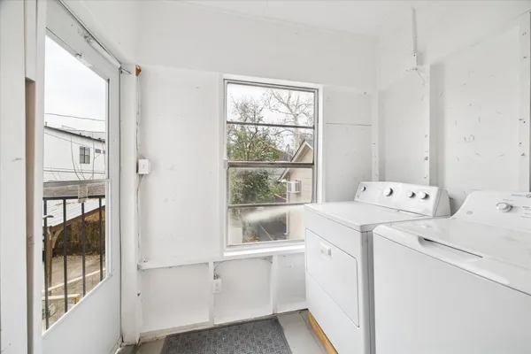 a utility room with dryer and washer