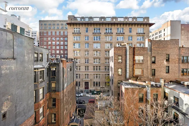 a kitchen with a refrigerator stove and microwave