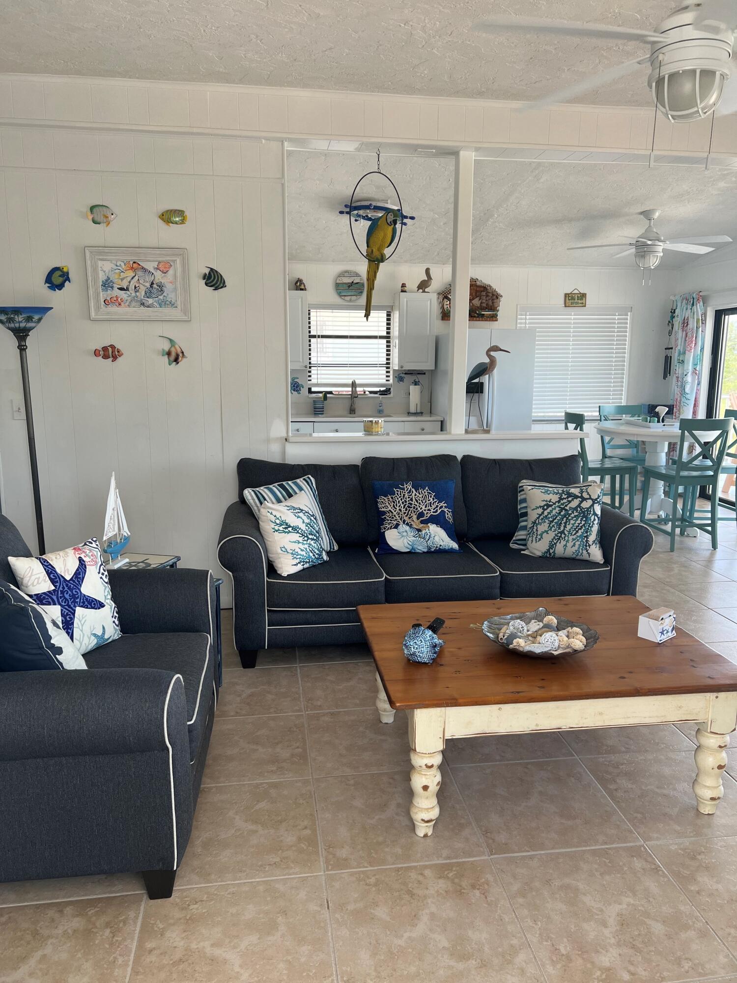 16 Shoreland Drive Key Largo, FL 33037 - Photo 6 of 16 a living room with furniture and wooden floor