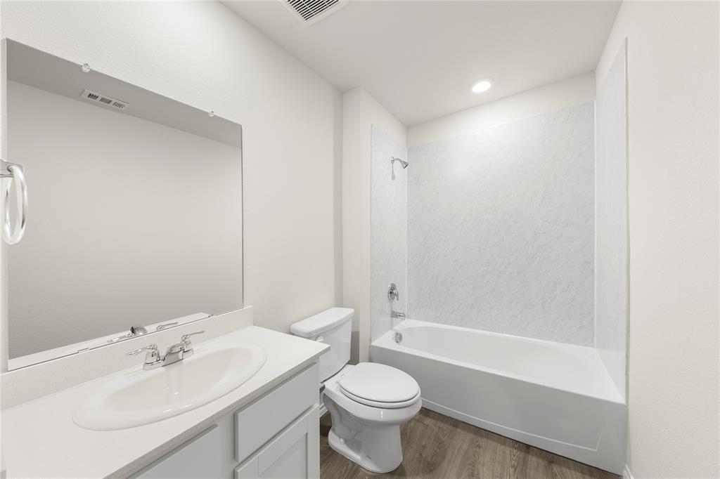 3400 Rendezvous Way Sherman, TX 75090 - Photo 13 of 17 a bathroom with a sink toilet and shower