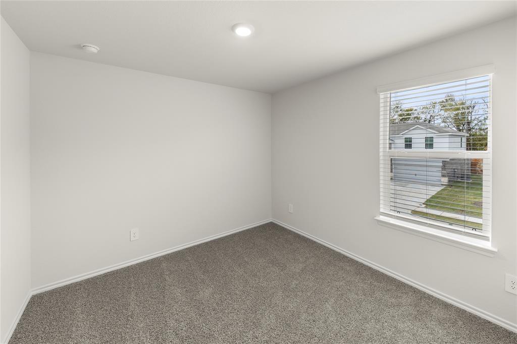 3400 Rendezvous Way Sherman, TX 75090 - Photo 14 of 17 an empty room with windows