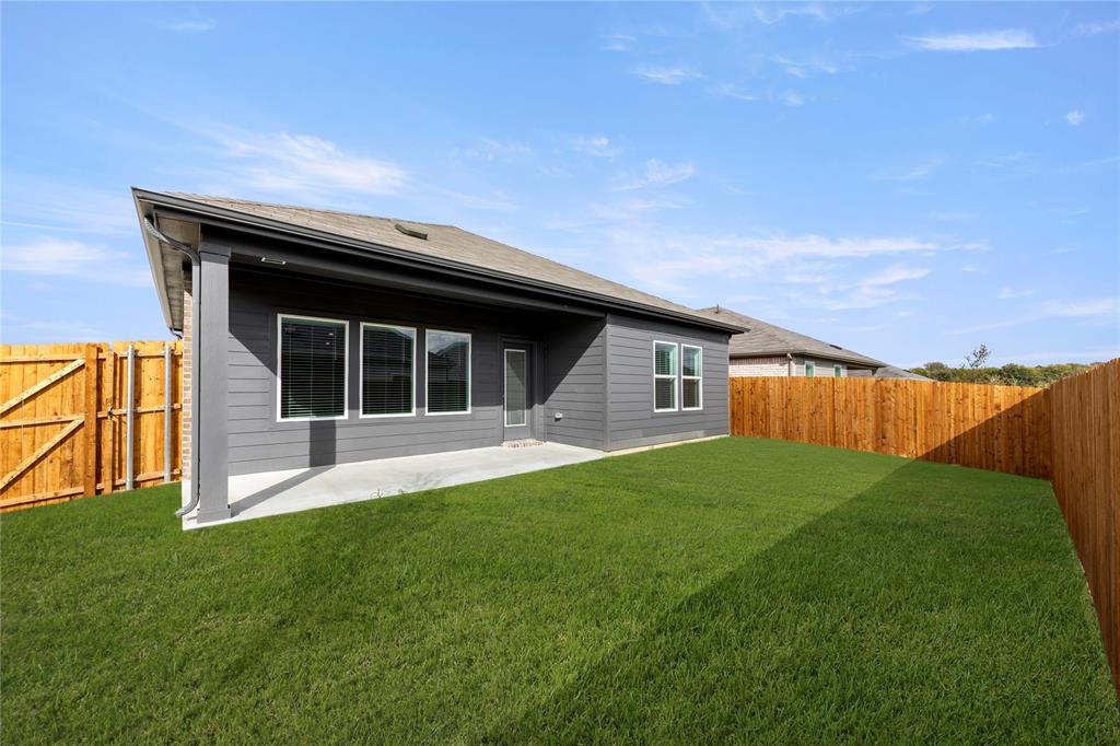 3400 Rendezvous Way Sherman, TX 75090 - Photo 15 of 17 a backyard of a house with large trees