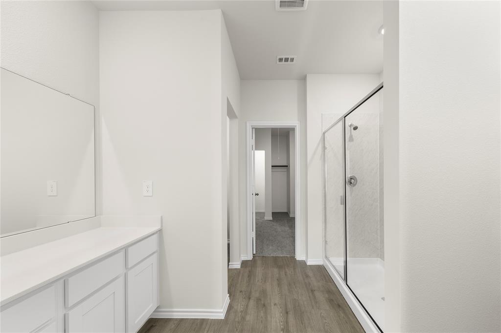 3400 Rendezvous Way Sherman, TX 75090 - Photo 7 of 17 a view of hallway with wooden floor