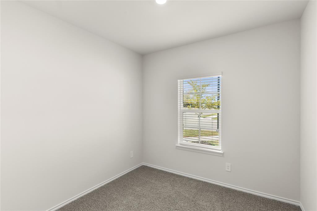 3400 Rendezvous Way Sherman, TX 75090 - Photo 8 of 17 a view of an empty room with a window