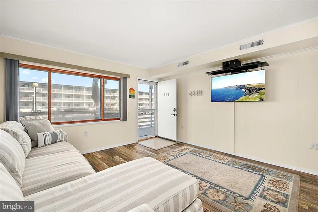 a kitchen with a refrigerator and a sink