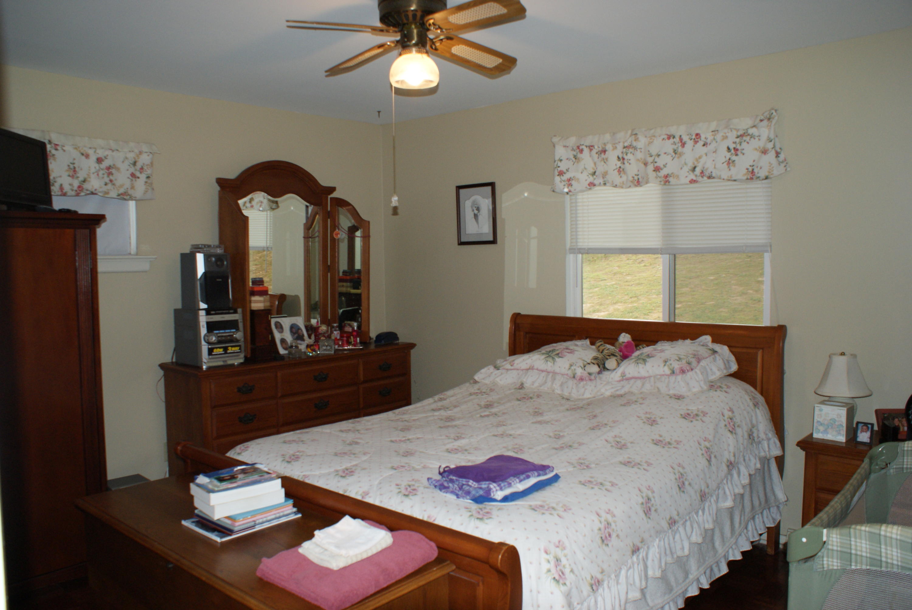3630 Grandin Road Roanoke, VA 24018 - Photo 12 of 21 a bedroom with a bed and dresser