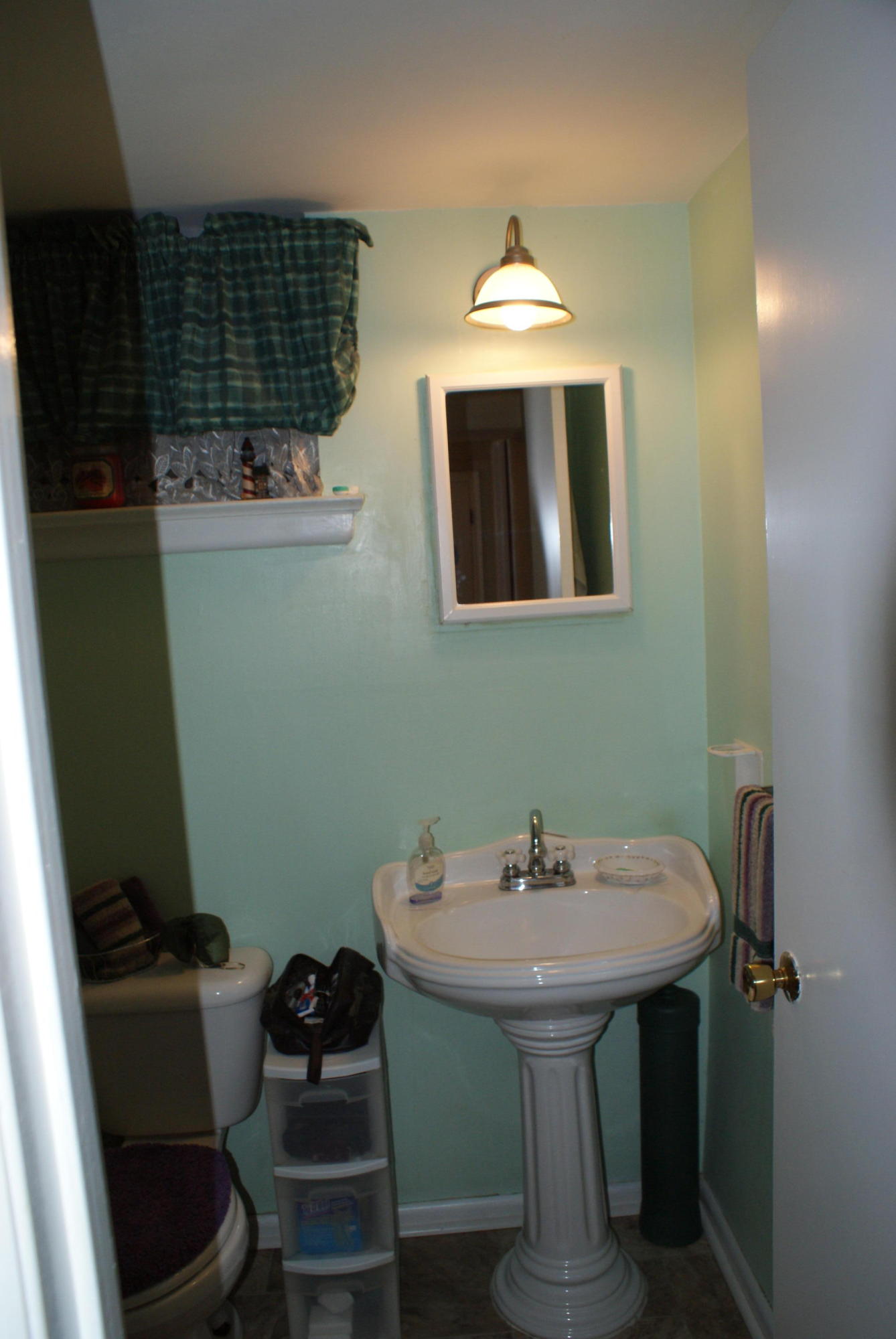 3630 Grandin Road Roanoke, VA 24018 - Photo 16 of 21 a bathroom with a sink and a mirror