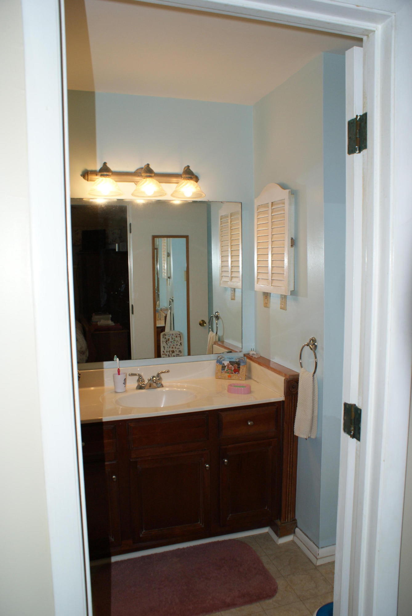 3630 Grandin Road Roanoke, VA 24018 - Photo 18 of 21 a bathroom with a double vanity sink and a mirror