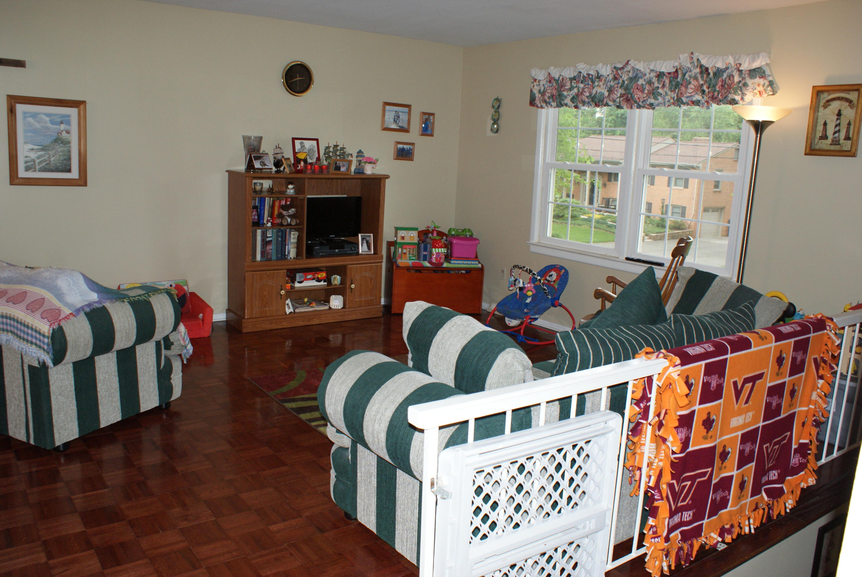 3630 Grandin Road Roanoke, VA 24018 - Photo 7 of 21 a living room with furniture and a flat screen tv