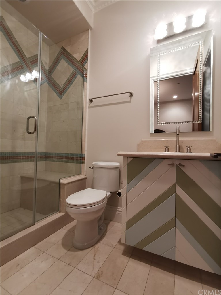 501 Cortez Road Arcadia, CA 91007 - Photo 14 of 15 a bathroom with a sink toilet and shower