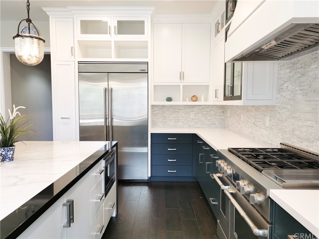 501 Cortez Road Arcadia, CA 91007 - Photo 3 of 15 a kitchen with stainless steel appliances granite countertop a stove and a refrigerator