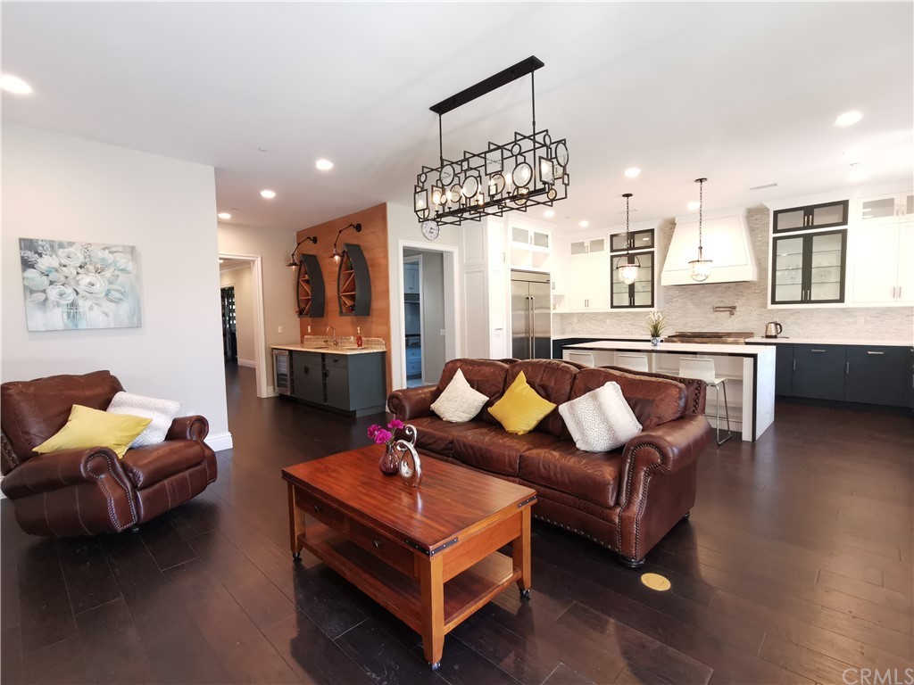 501 Cortez Road Arcadia, CA 91007 - Photo 8 of 15 a living room with furniture and a chandelier