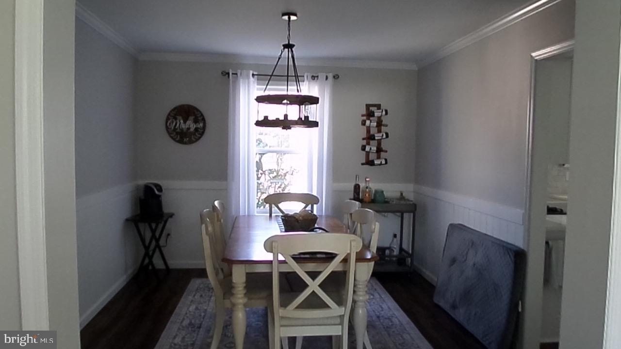 129 Country Lane Sicklerville, NJ 08081 - Photo 18 of 53 a view of a dining room with furniture window and wooden floor