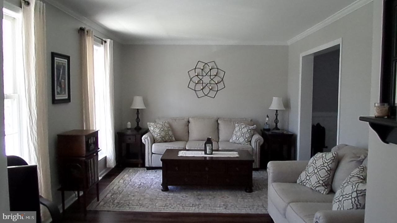 129 Country Lane Sicklerville, NJ 08081 - Photo 2 of 53 a living room with furniture and a fireplace