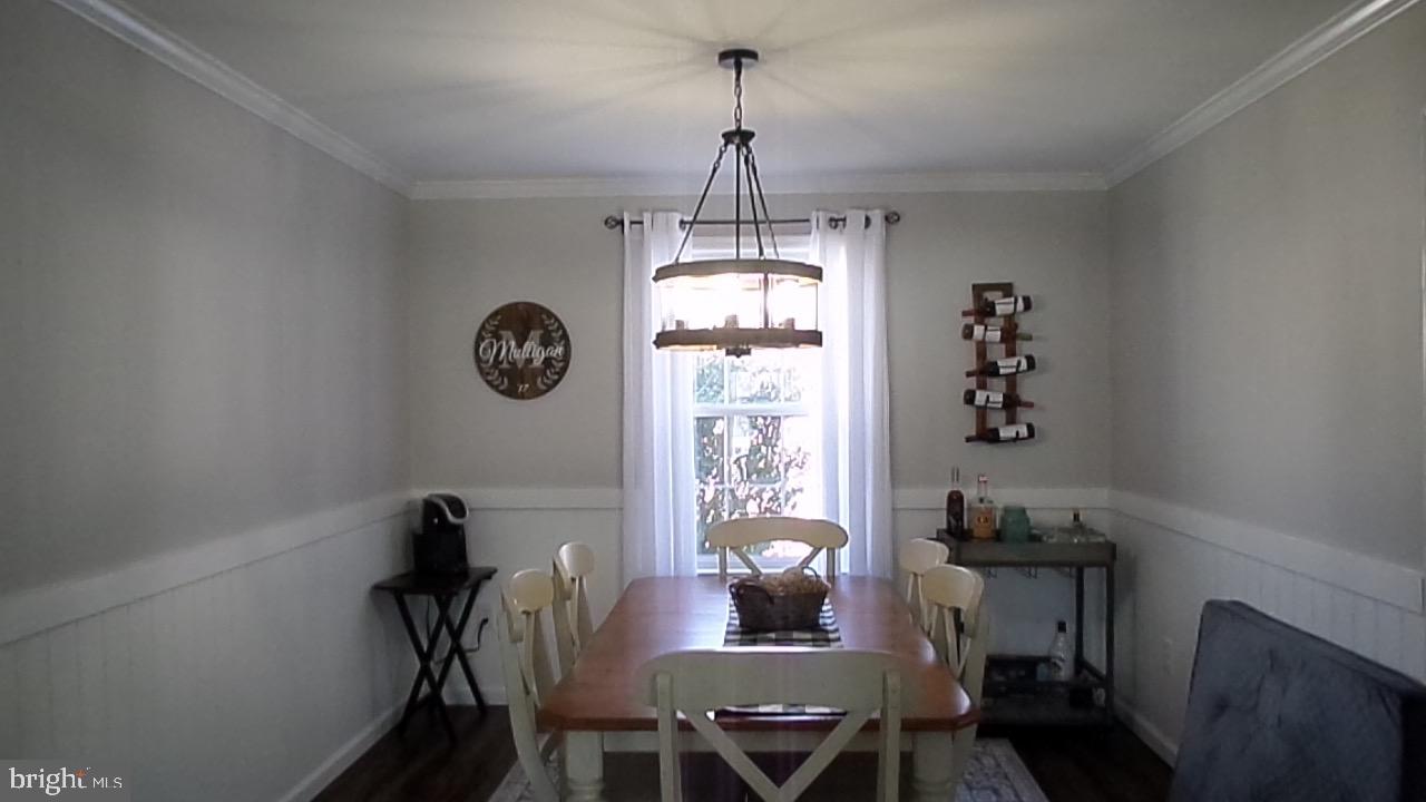 129 Country Lane Sicklerville, NJ 08081 - Photo 21 of 53 a view of a dining room with furniture window and wooden floor