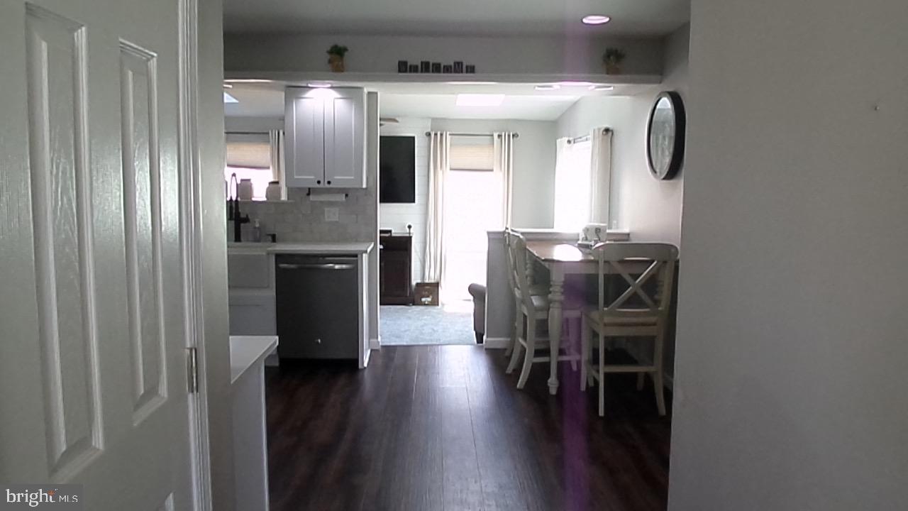 129 Country Lane Sicklerville, NJ 08081 - Photo 23 of 53 a kitchen with refrigerator and window