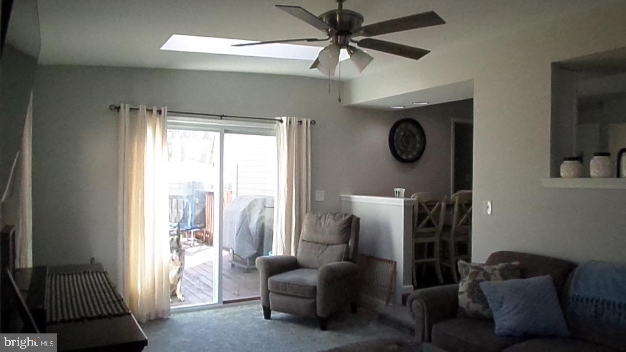 129 Country Lane Sicklerville, NJ 08081 - Photo 26 of 53 a living room with furniture and a window