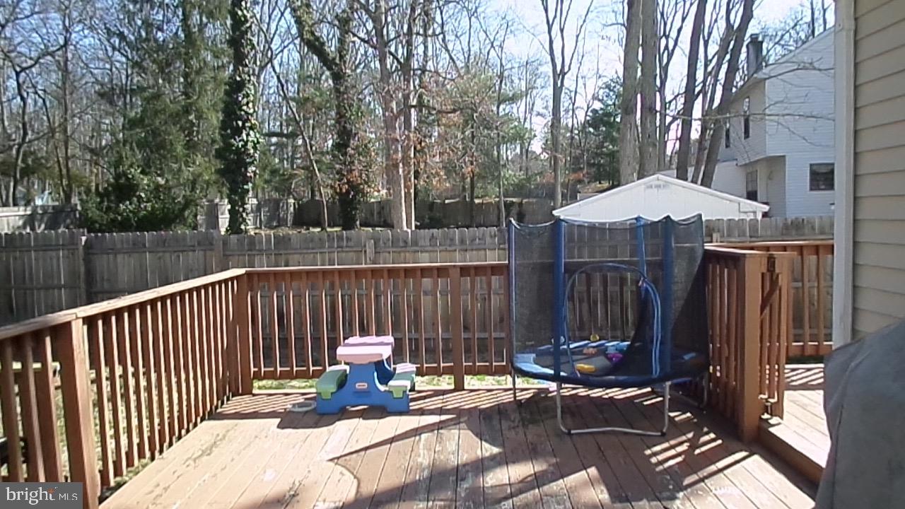 129 Country Lane Sicklerville, NJ 08081 - Photo 29 of 53 a view of a patio with a table and chairs