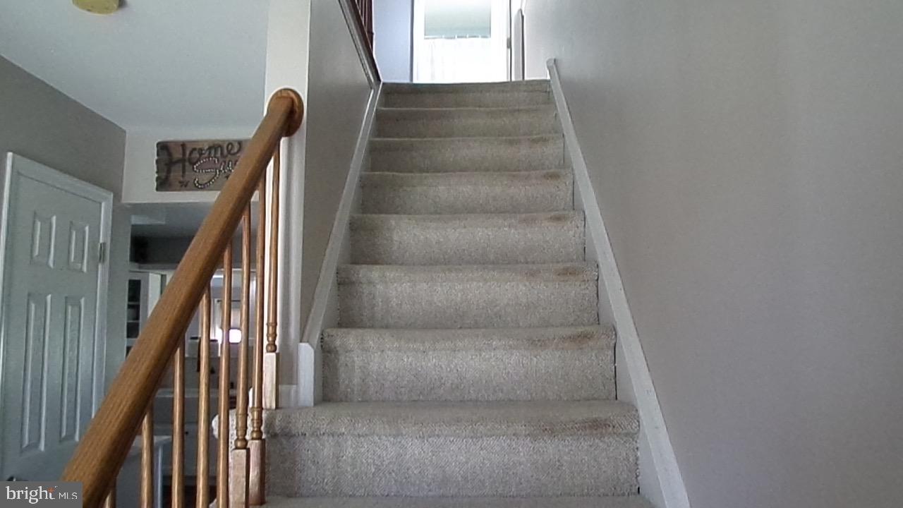 129 Country Lane Sicklerville, NJ 08081 - Photo 4 of 53 a view of staircase with white walls and stairs