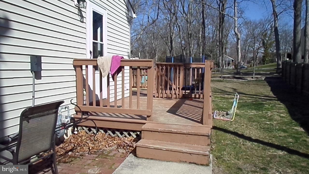 129 Country Lane Sicklerville, NJ 08081 - Photo 41 of 53 a view of a bench in a patio
