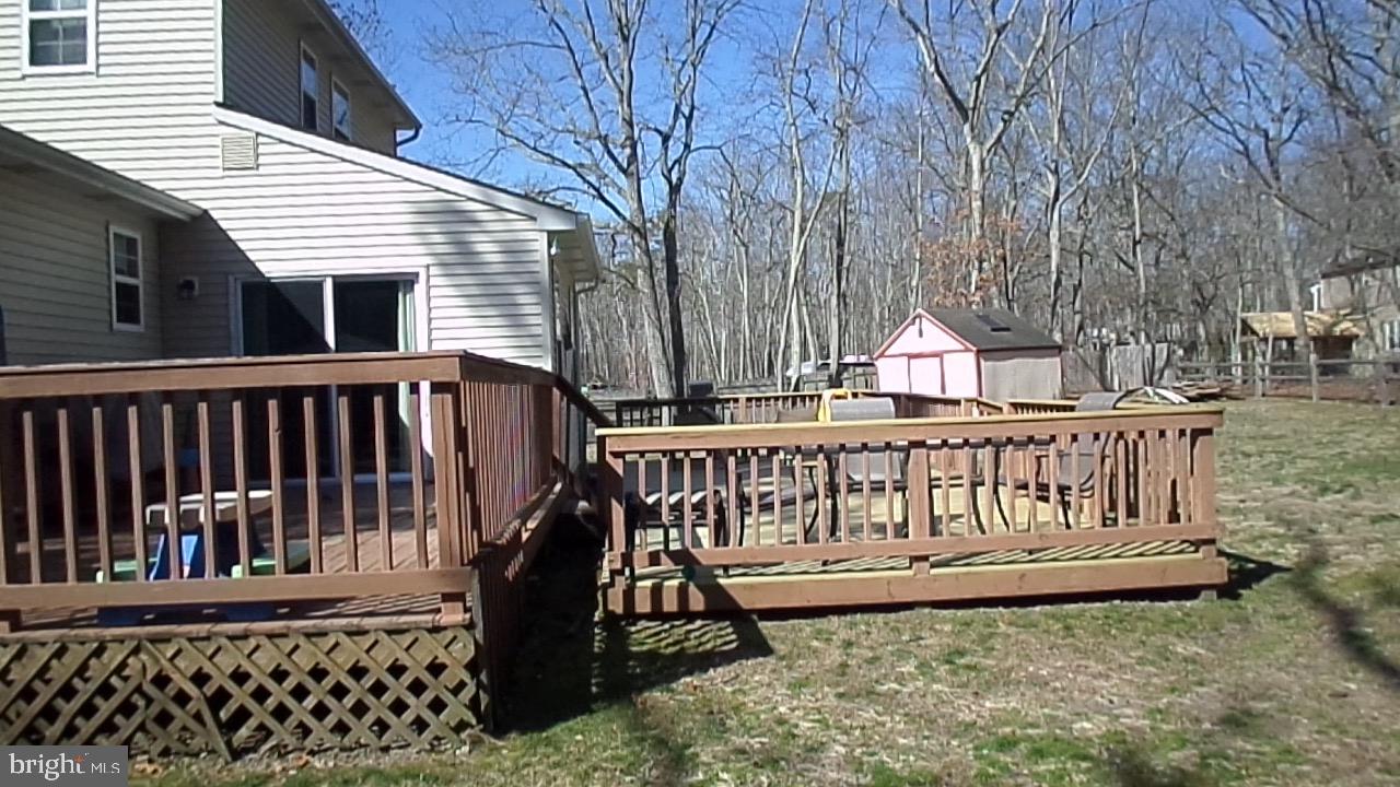 129 Country Lane Sicklerville, NJ 08081 - Photo 43 of 53 a view of a deck with a fence