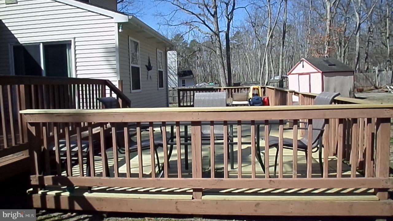 129 Country Lane Sicklerville, NJ 08081 - Photo 47 of 53 a view of a house with wooden fence